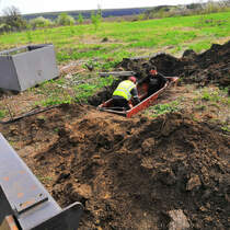 Наши специалисты делают прокол под дорогой установкой Ditch Witch P80